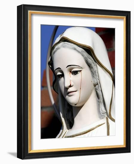 Red Stains are Seen Running from the Left Eye of a Statue of the Virgin Mary-null-Framed Photographic Print