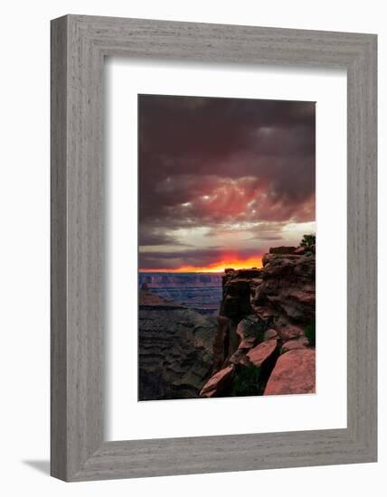 Red sunset with moody clouds and red rock canyons in Dead Horse Point State Park near Moab, Utah-David Chang-Framed Photographic Print