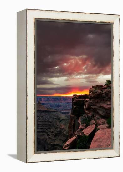 Red sunset with moody clouds and red rock canyons in Dead Horse Point State Park near Moab, Utah-David Chang-Framed Premier Image Canvas