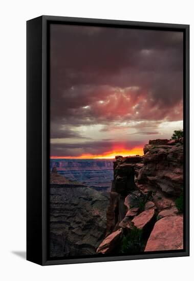 Red sunset with moody clouds and red rock canyons in Dead Horse Point State Park near Moab, Utah-David Chang-Framed Premier Image Canvas