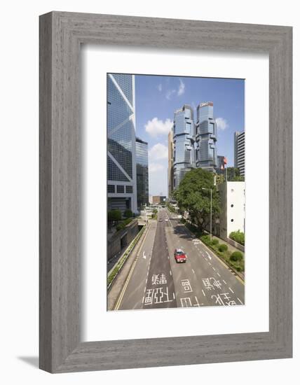 Red taxi cab in Central, Hong Kong Island, with the Bank of China Tower and Lippo Centre beyond, Ho-Fraser Hall-Framed Photographic Print