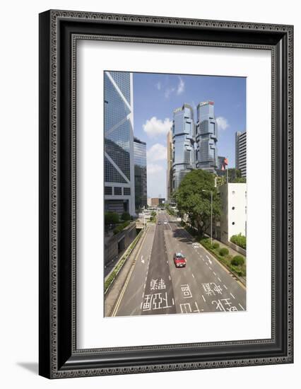 Red taxi cab in Central, Hong Kong Island, with the Bank of China Tower and Lippo Centre beyond, Ho-Fraser Hall-Framed Photographic Print