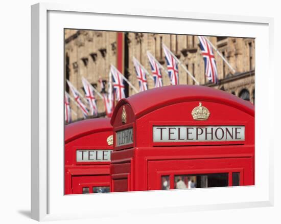 Red Telephone Boxes Opposite Harrod's, Knightsbridge, London, England, United Kingdom, Europe-Stuart Black-Framed Photographic Print