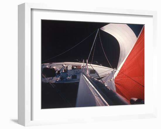 Red Topped Spinnaker Bellying Out from Nefertiti's Towering Mast During America's Cup Trials-George Silk-Framed Photographic Print