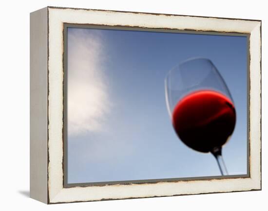 Red Wine Glass Against a Blue Sky, Paris, France-Michele Molinari-Framed Premier Image Canvas