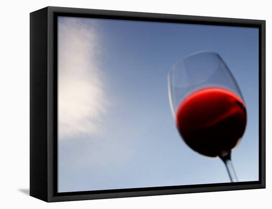 Red Wine Glass Against a Blue Sky, Paris, France-Michele Molinari-Framed Premier Image Canvas