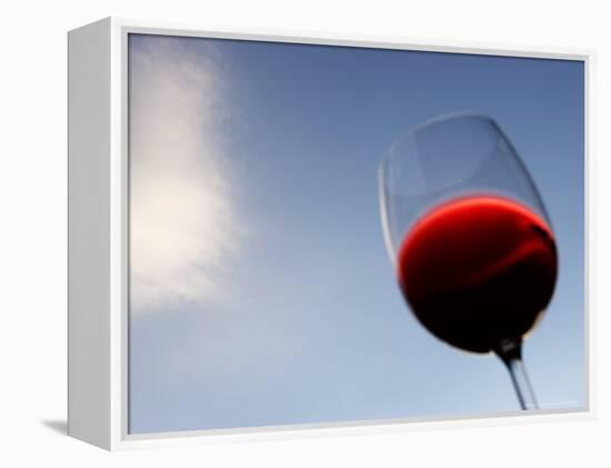 Red Wine Glass Against a Blue Sky, Paris, France-Michele Molinari-Framed Premier Image Canvas