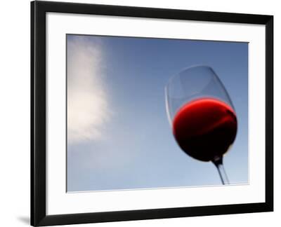 Red Wine Glass Against A Blue Sky Paris France Photographic Print By Michele Molinari Art Com