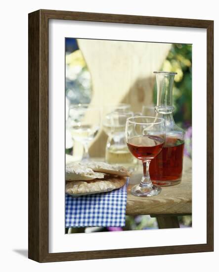 Red Wine in Glass and Carafe, Schüttelbrot Beside (S. Tyrol)-Eising Studio - Food Photo and Video-Framed Photographic Print