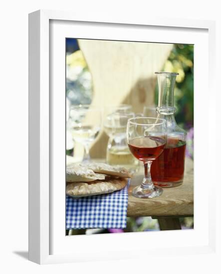 Red Wine in Glass and Carafe, Schüttelbrot Beside (S. Tyrol)-Eising Studio - Food Photo and Video-Framed Photographic Print