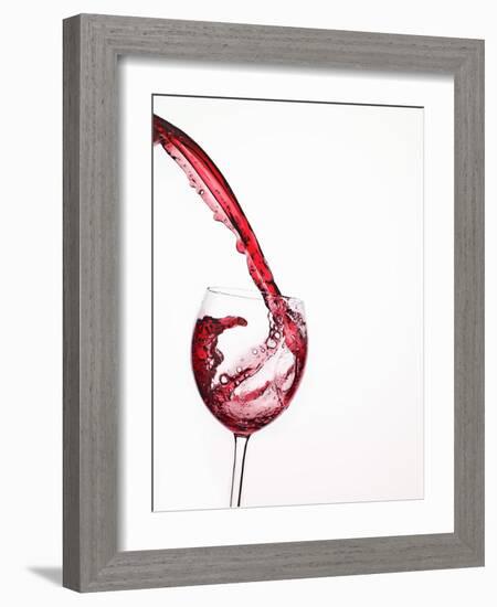 Red Wine Pouring into a Glass from Bottle-null-Framed Photographic Print