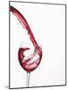 Red Wine Pouring into a Glass from Bottle-null-Mounted Photographic Print