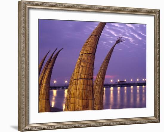 Reed Boats are Stacked Along the Beach at the Fishing Village of Huanchaco in Northern Peru-Andrew Watson-Framed Photographic Print