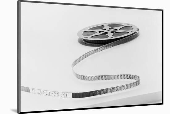 Reel of Movie Film-null-Mounted Photographic Print