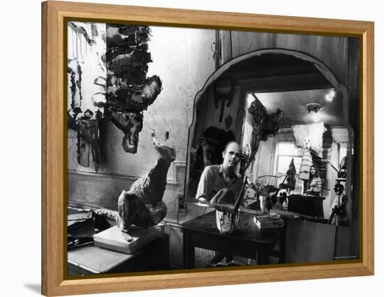 Reflected Portrait of Artist Claes Oldenburg, Sitting in Dirty, Studio Apartment-Yale Joel-Framed Premier Image Canvas