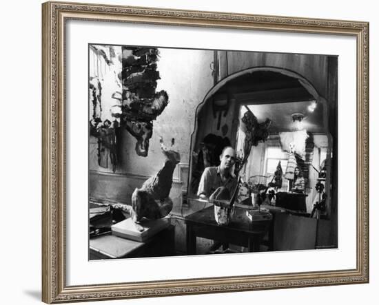 Reflected Portrait of Artist Claes Oldenburg, Sitting in Dirty, Studio Apartment-Yale Joel-Framed Premium Photographic Print