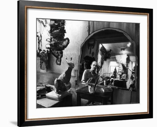 Reflected Portrait of Artist Claes Oldenburg, Sitting in Dirty, Studio Apartment-Yale Joel-Framed Premium Photographic Print