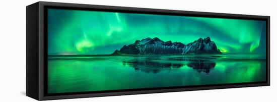 Reflection of Aurora Borealis in the sea with Vestrahorn mountains in center, Stokksnes Beach, S...-null-Framed Premier Image Canvas