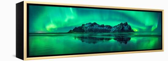 Reflection of Aurora Borealis in the sea with Vestrahorn mountains in center, Stokksnes Beach, S...-null-Framed Premier Image Canvas