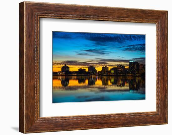 Reflection of buildings on water, Lake Merritt, Oakland, California, USA-null-Framed Photographic Print