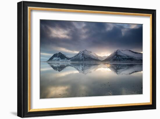 Reflection of mountains on ocean at sunset in Vatnajokull National Park in eastern Iceland-Alex Saberi-Framed Photographic Print