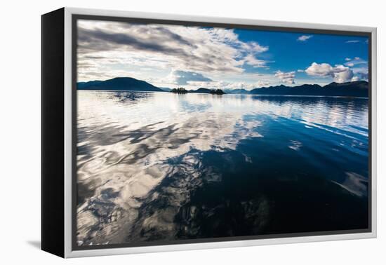 Reflections in the calm waters of the Inside Passage, Southeast Alaska, USA-Mark A Johnson-Framed Premier Image Canvas