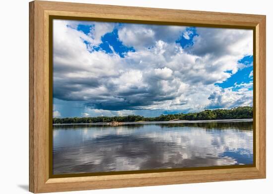 Reflections of clouds in the Casiquiare River in the deep south of Venezuela-Michael Runkel-Framed Premier Image Canvas