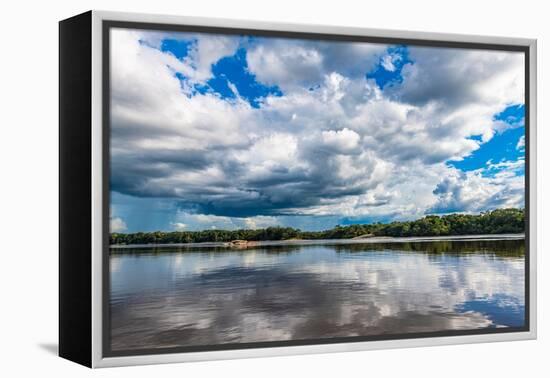 Reflections of clouds in the Casiquiare River in the deep south of Venezuela-Michael Runkel-Framed Premier Image Canvas