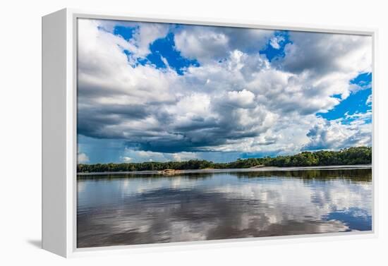 Reflections of clouds in the Casiquiare River in the deep south of Venezuela-Michael Runkel-Framed Premier Image Canvas