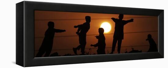 Refugee Children Playing on a Railway Near their Camp at Sunset, in Islamabad, Pakistan-null-Framed Premier Image Canvas