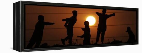 Refugee Children Playing on a Railway Near their Camp at Sunset, in Islamabad, Pakistan-null-Framed Premier Image Canvas