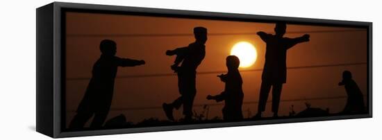 Refugee Children Playing on a Railway Near their Camp at Sunset, in Islamabad, Pakistan-null-Framed Premier Image Canvas
