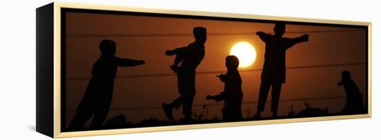 Refugee Children Playing on a Railway Near their Camp at Sunset, in Islamabad, Pakistan-null-Framed Premier Image Canvas