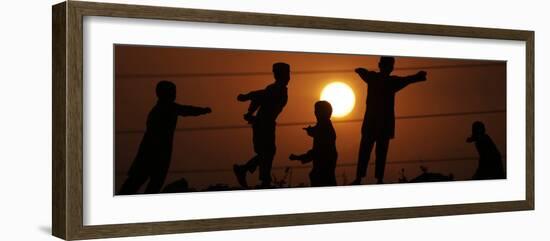 Refugee Children Playing on a Railway Near their Camp at Sunset, in Islamabad, Pakistan-null-Framed Photographic Print