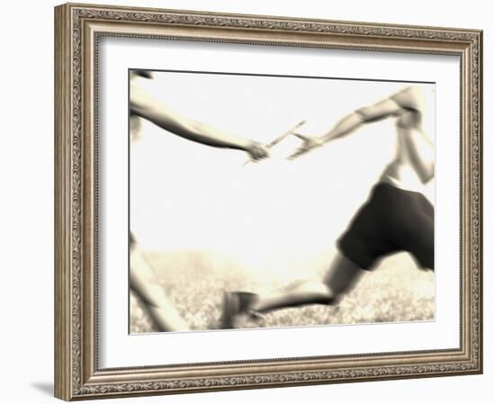 Relay Racers Handing Off the Baton-null-Framed Photographic Print