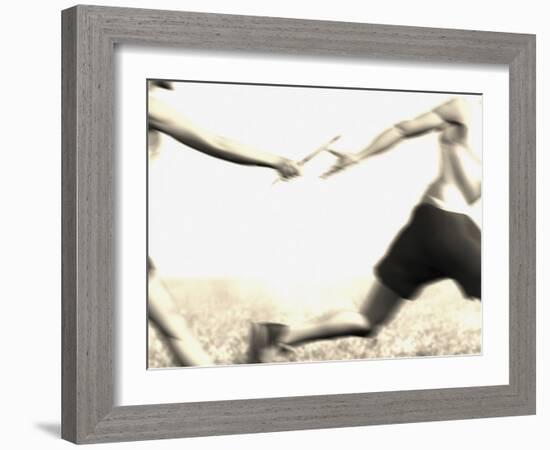 Relay Racers Handing Off the Baton-null-Framed Photographic Print