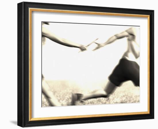 Relay Racers Handing Off the Baton-null-Framed Photographic Print