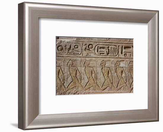 Relief of captured Nubian prisoners of war, Temple of Rameses II, Abu Simbel, Egypt-Werner Forman-Framed Photographic Print