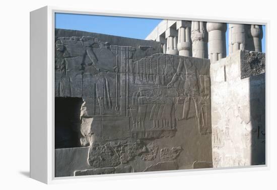 Relief of the Pharaoh Smiting His Enemies, Temple Sacred to Amun, Mut and Khons, Luxor, Egypt-CM Dixon-Framed Premier Image Canvas