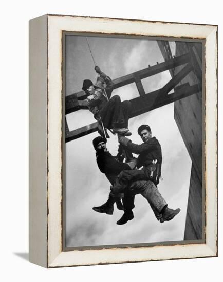 Relief Workers Hanging from Cable in Front of a Giant Beam During the Construction of Fort Peck Dam-Margaret Bourke-White-Framed Premier Image Canvas