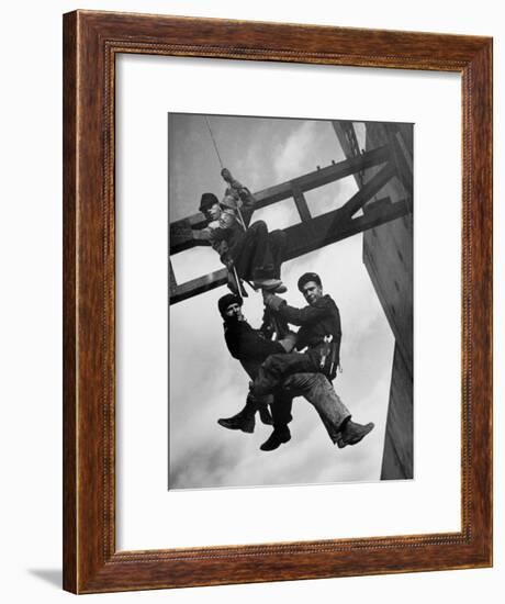 Relief Workers Hanging from Cable in Front of a Giant Beam During the Construction of Fort Peck Dam-Margaret Bourke-White-Framed Premium Photographic Print