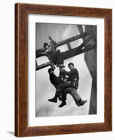 Relief Workers Hanging from Cable in Front of a Giant Beam During the Construction of Fort Peck Dam-Margaret Bourke-White-Framed Photographic Print