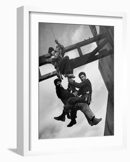 Relief Workers Hanging from Cable in Front of a Giant Beam During the Construction of Fort Peck Dam-Margaret Bourke-White-Framed Photographic Print