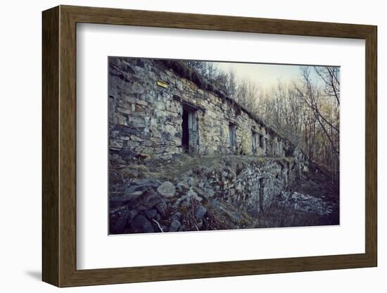 Remains of a bunker with door and windows at a mountain in a wood in winter in Alsace-Axel Killian-Framed Photographic Print