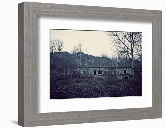 Remains of a bunker with door and windows at a mountain in a wood in winter in Alsace-Axel Killian-Framed Photographic Print