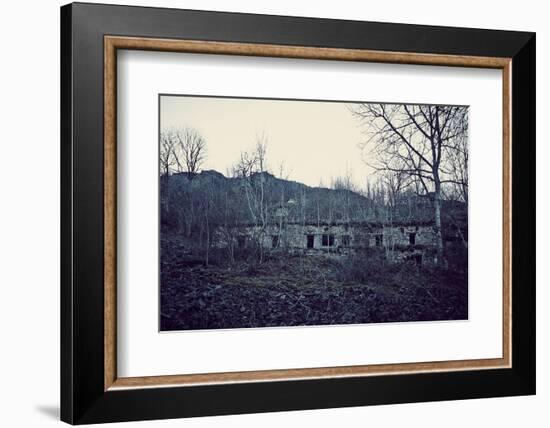 Remains of a bunker with door and windows at a mountain in a wood in winter in Alsace-Axel Killian-Framed Photographic Print