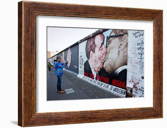 Remains of the Berlin Wall at the East Side Gallery in Berlin, Germany-null-Framed Art Print