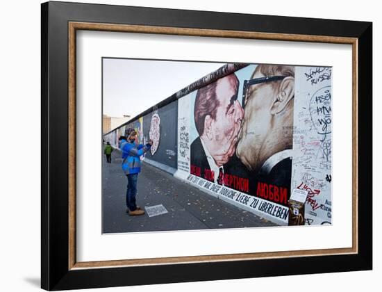 Remains of the Berlin Wall at the East Side Gallery in Berlin, Germany-null-Framed Art Print