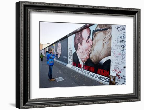 Remains of the Berlin Wall at the East Side Gallery in Berlin, Germany-null-Framed Art Print