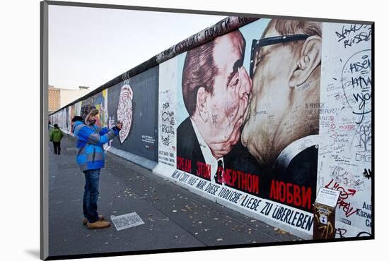 Remains of the Berlin Wall at the East Side Gallery in Berlin, Germany-null-Mounted Art Print
